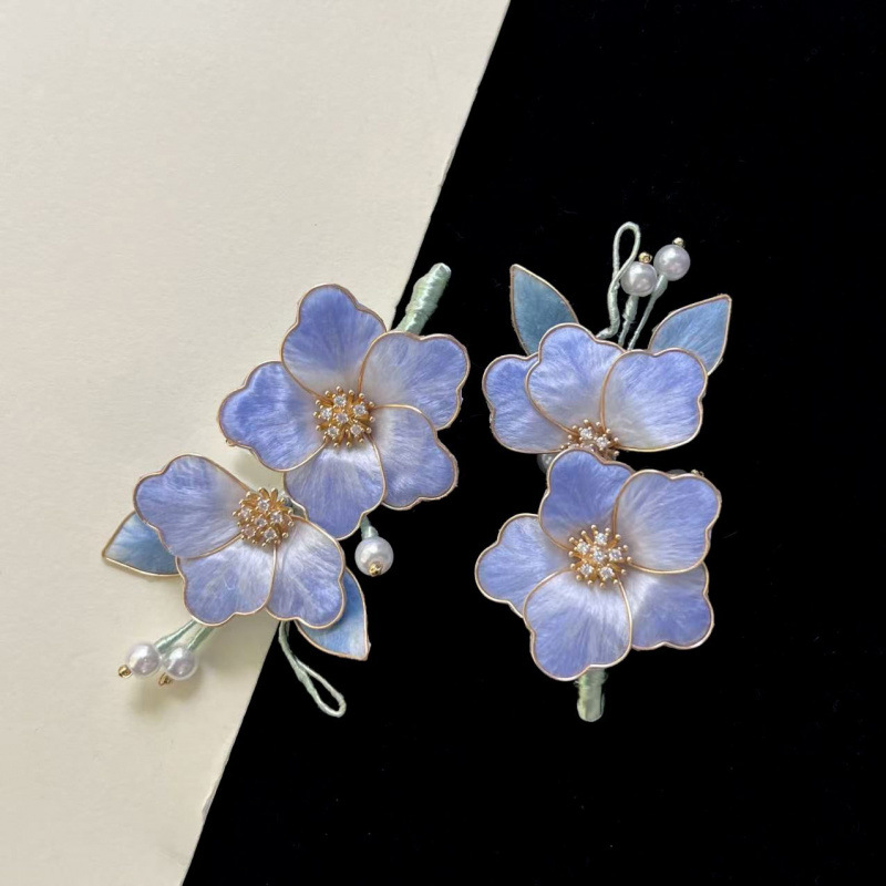 Two floral silhouettes · sample reference photograph