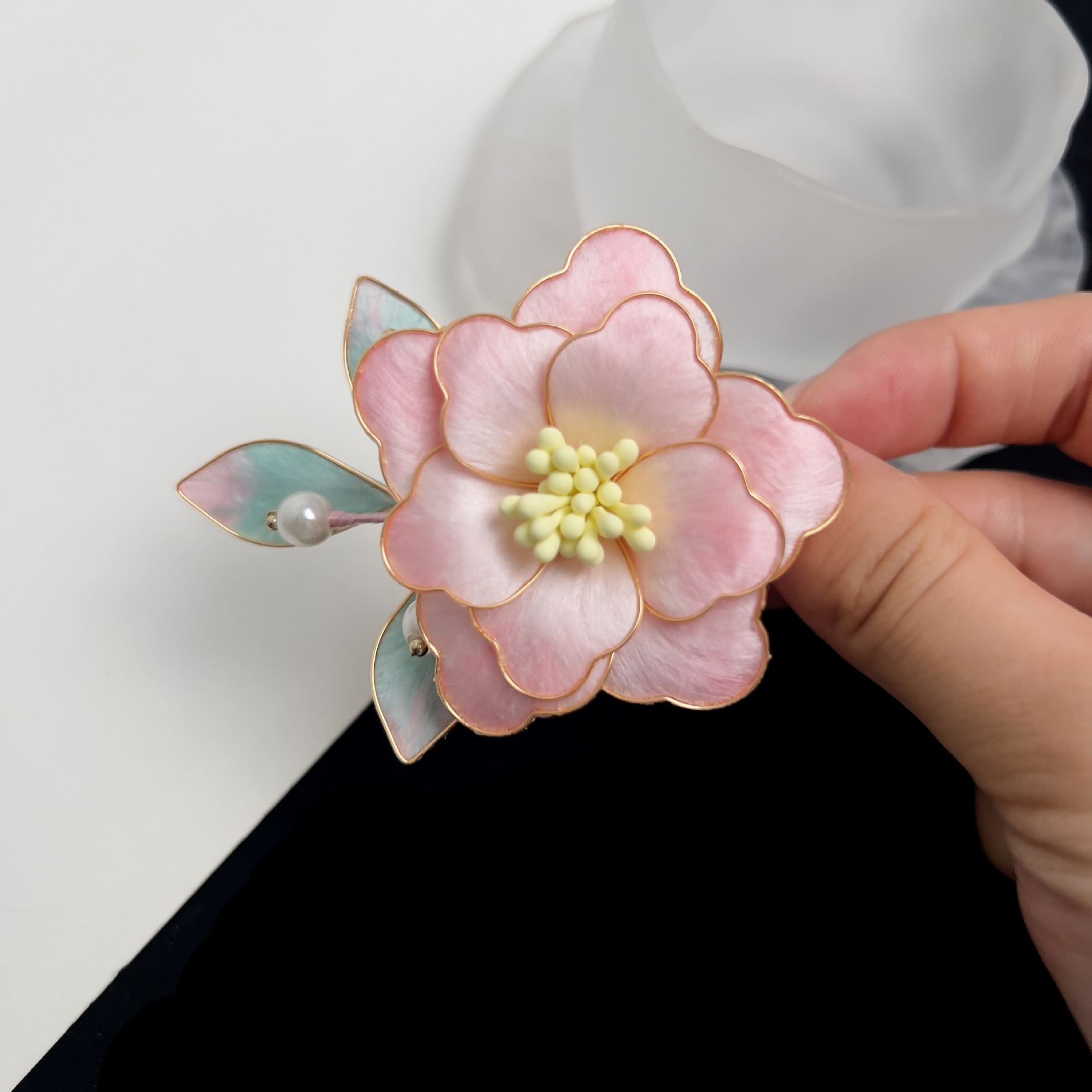 A view in the hand for scale · sample reference photograph
